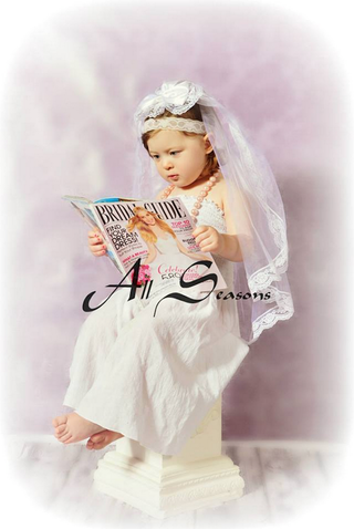 Illustration for article titled Great Idea for Your Small Baby: Buy Her a 'Future Bride' Photoshoot